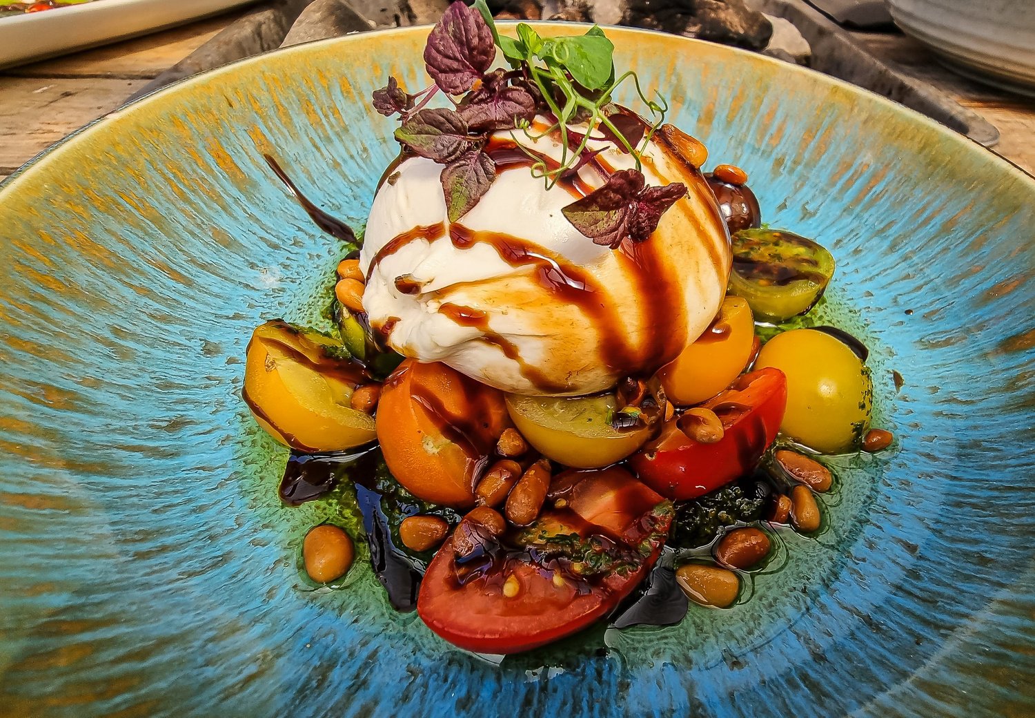 Burrata and tomato dish