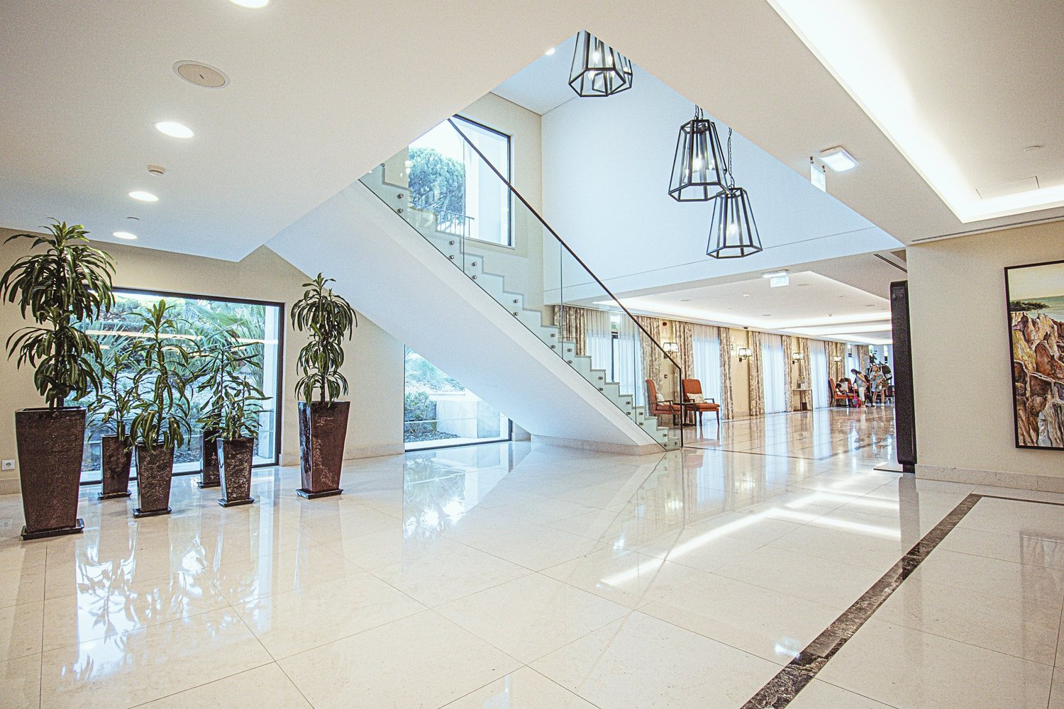 Modern white lobby with staircase
