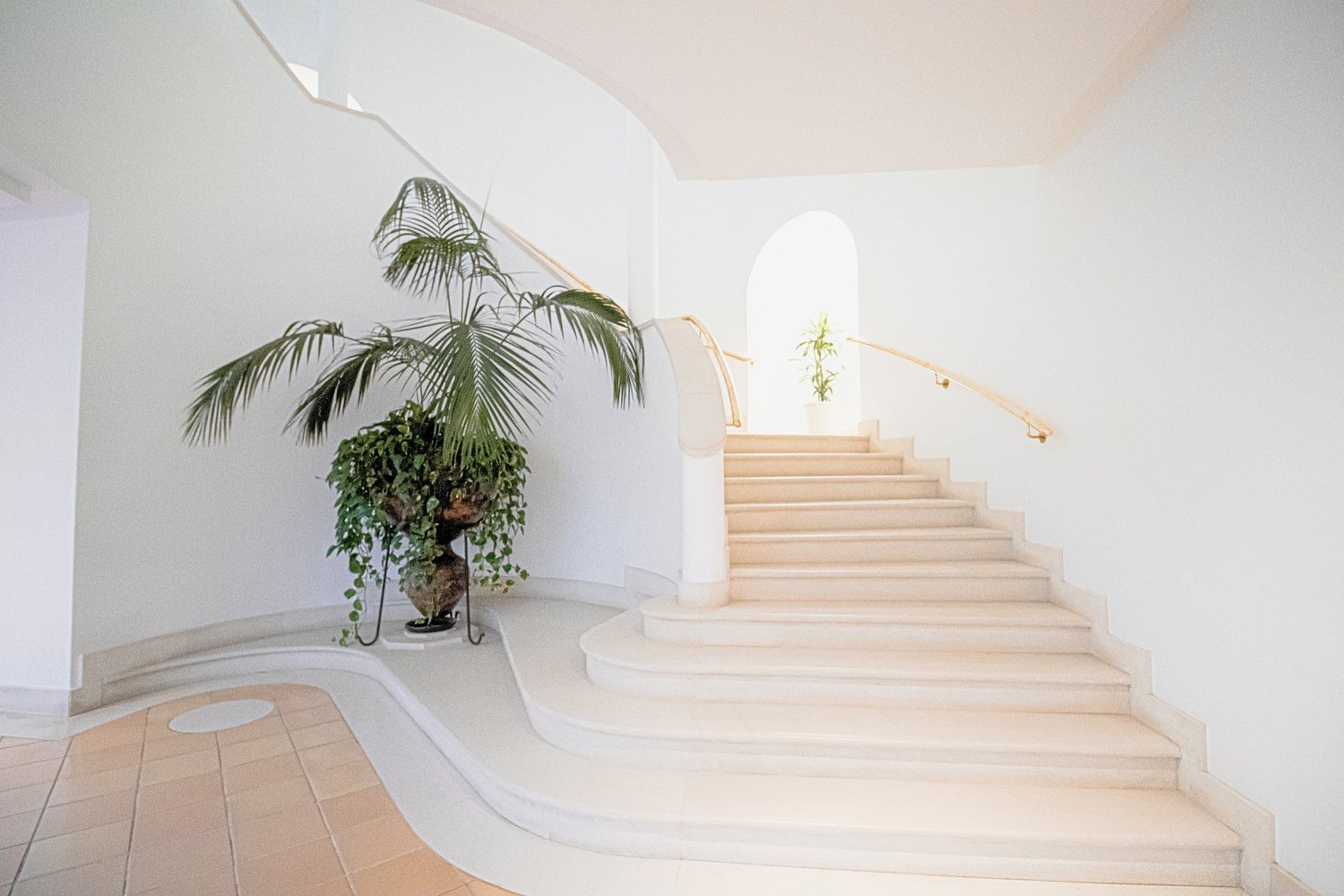 White curved staircase