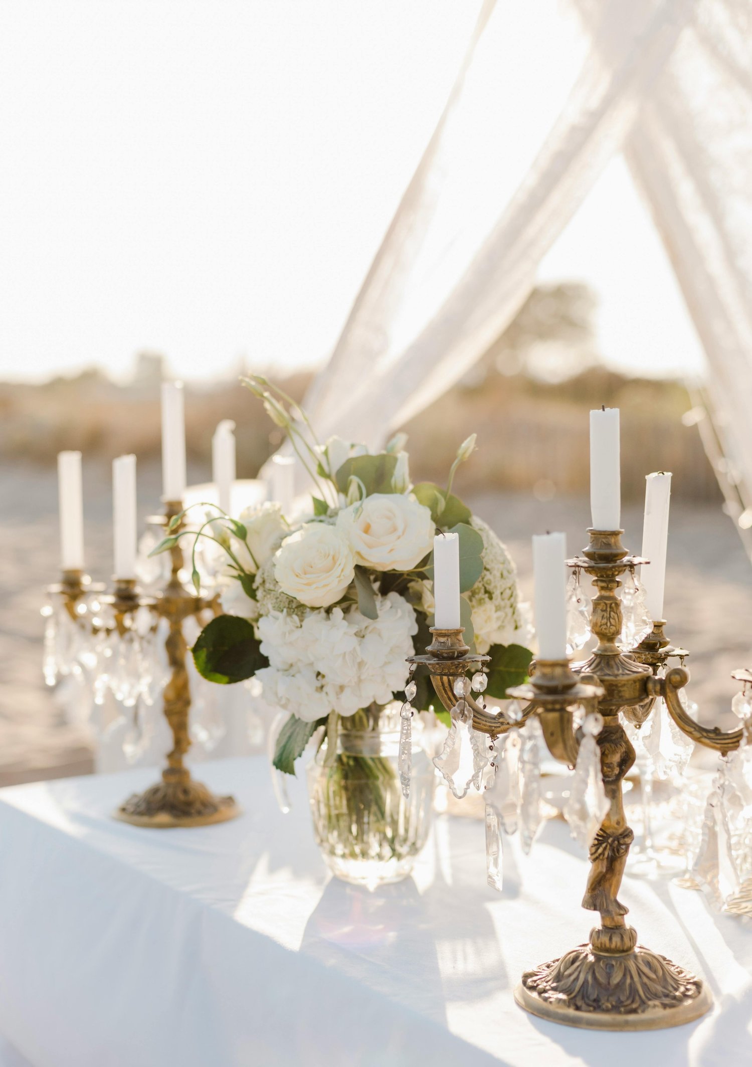 Candelabra with flowers at an event